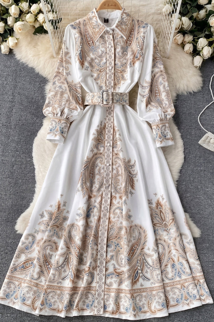 Elegant women's paisley embroidered abaya maxi dress, long modest fashion belted gown for special occasions.