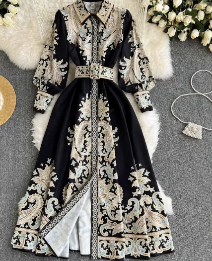 Women's modest abaya maxi dress with intricate paisley embroidery, flowing design, perfect for elegant events.