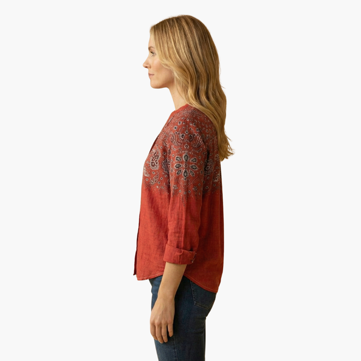 Women's fashion blouse with intricate paisley design, a stylish long sleeve top for various occasions.