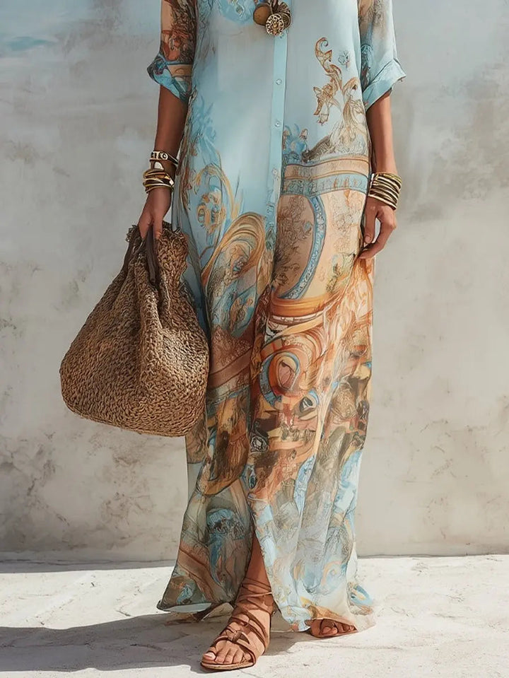 Printed women's elegant paisley maxi shirt dress. Button-through design, flowy fabric for effortless summer beachwear.