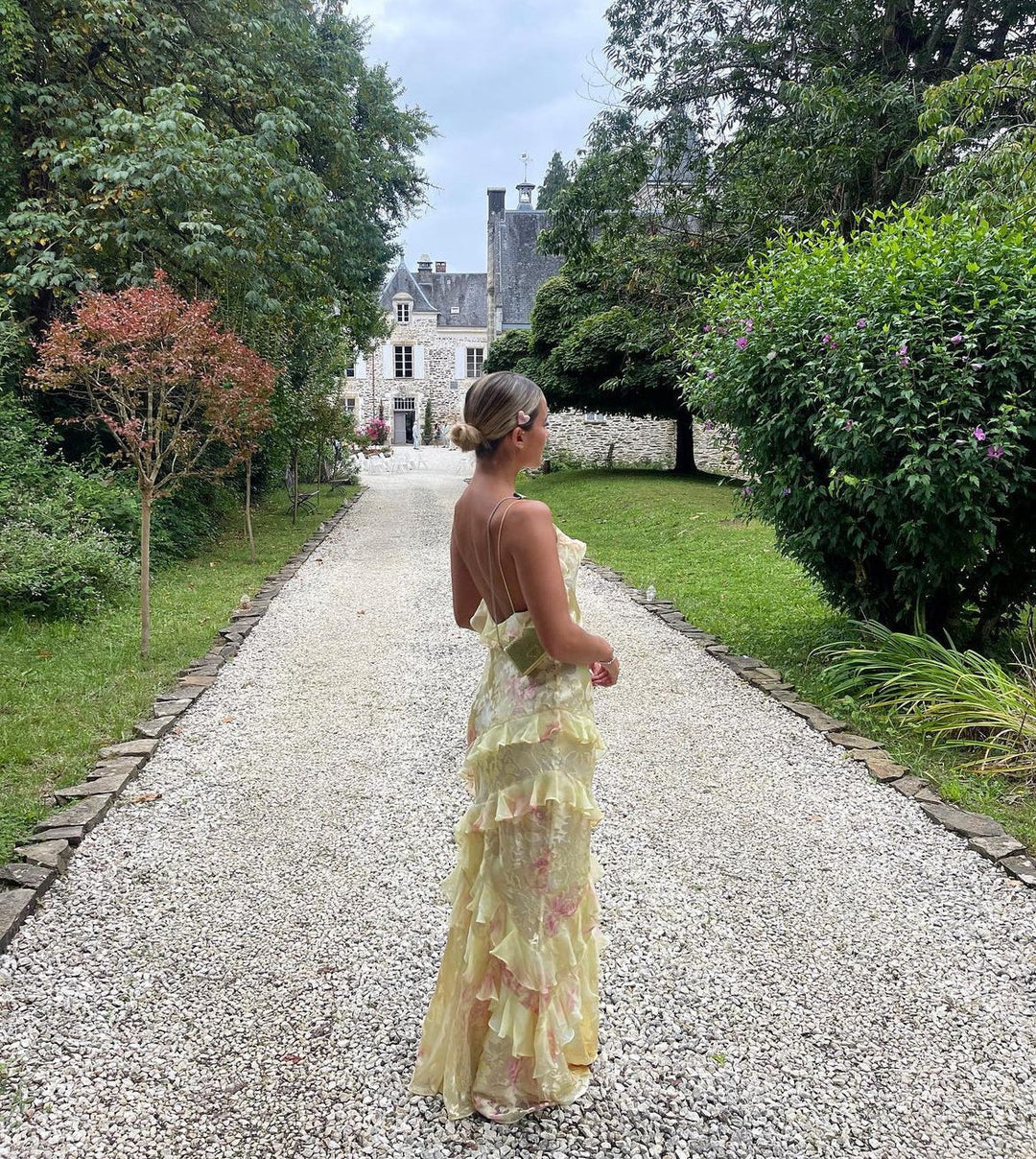 Women's special occasion evening dress, a beautiful pastel ruffle maxi design.