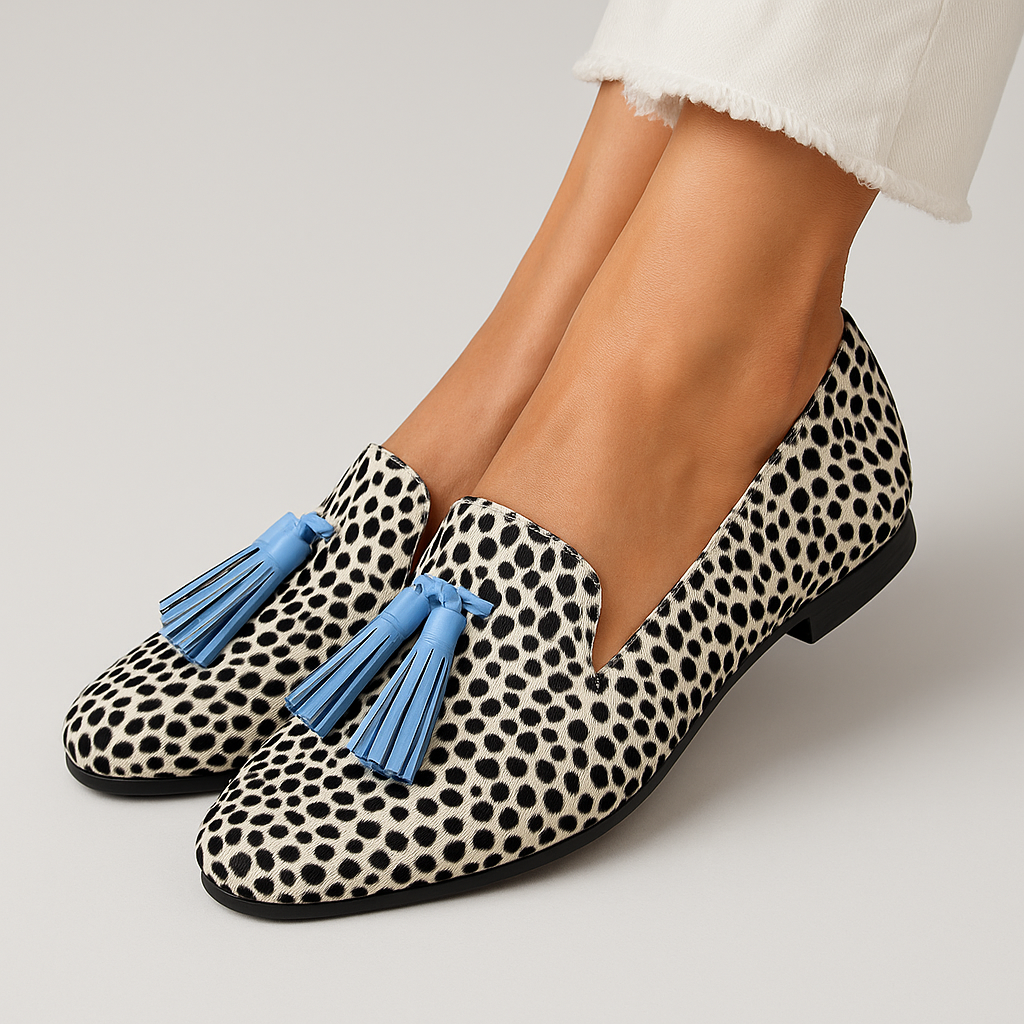 Elegant women's patterned tassel loafers with animal print, comfortable slip-on style, perfect for casual chic everyday wear.