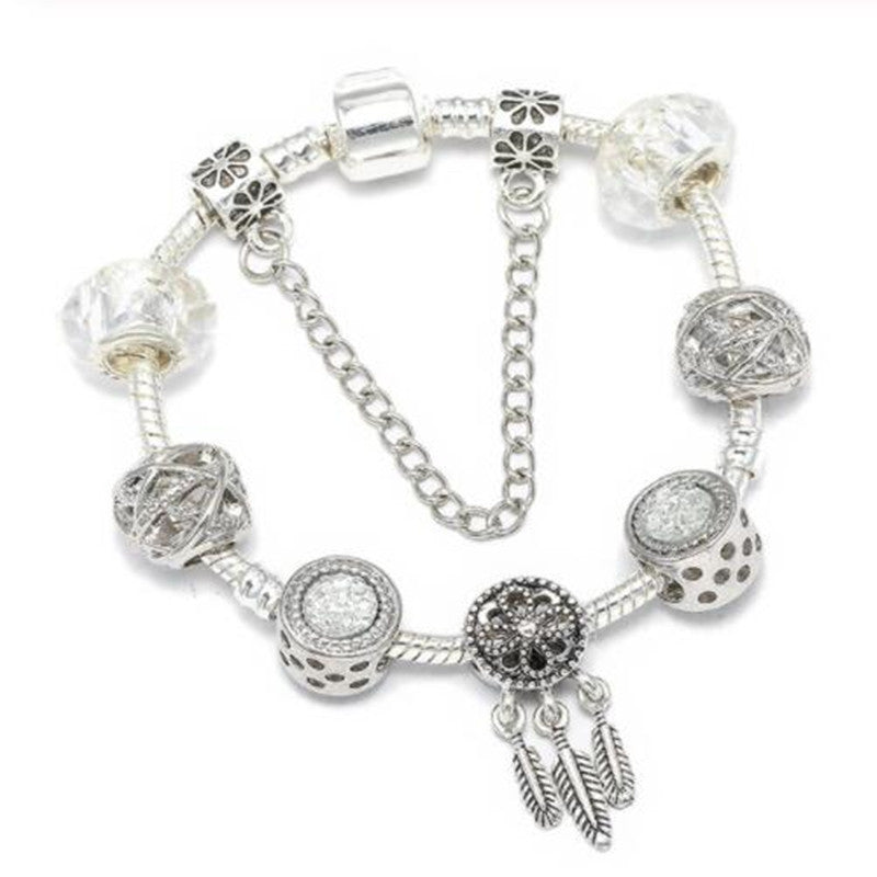 Elegant women's peach blossom charm bracelet. Perfect fashion jewelry for a stylish look or as a versatile gift for her.