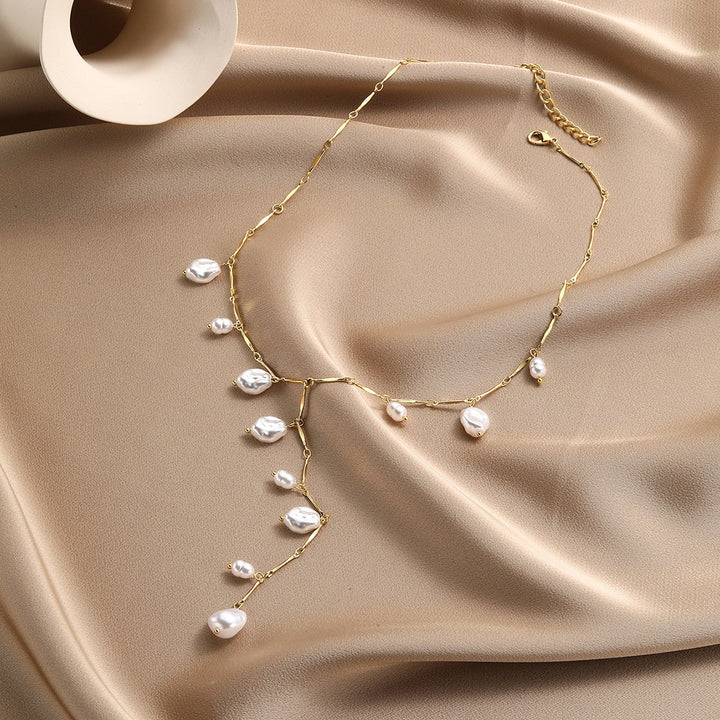 Sophisticated women's pearl waterfall dangle necklace, perfect for elegant occasions or as a thoughtful gift.
