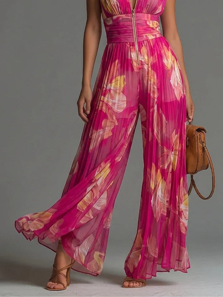 Women's elegant pink floral wide-leg halter jumpsuit, comfortable and stylish for any evening or party occasion.