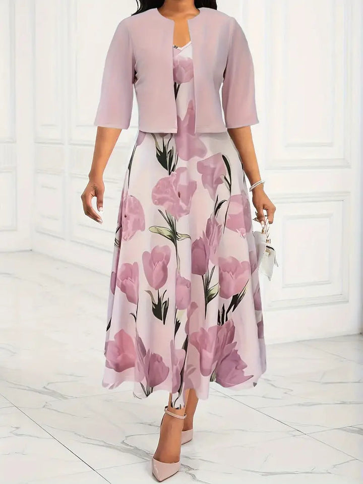 Elegant women's pink floral maxi dress and matching jacket set for summer or spring occasions.