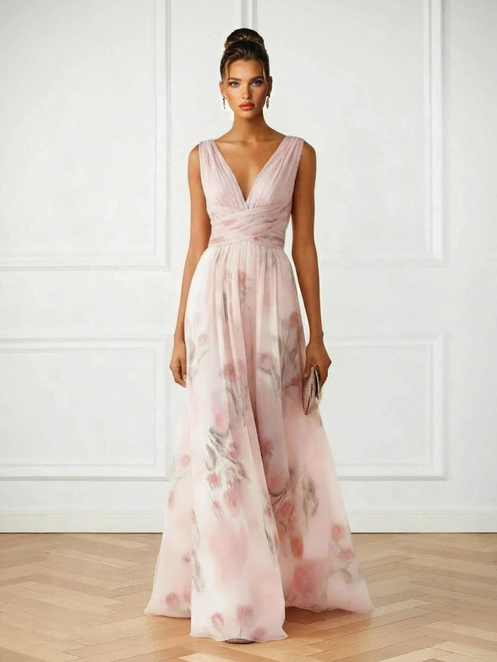 Elegant women's pink floral V-neck maxi dress, perfect for wedding guests & formal occasions. Sleeveless & long.