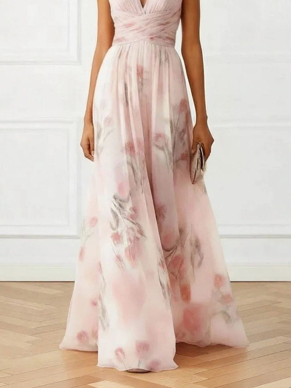 Women's elegant floral maxi dress with V-neckline & delicate pink print. Ideal formal or party wear.