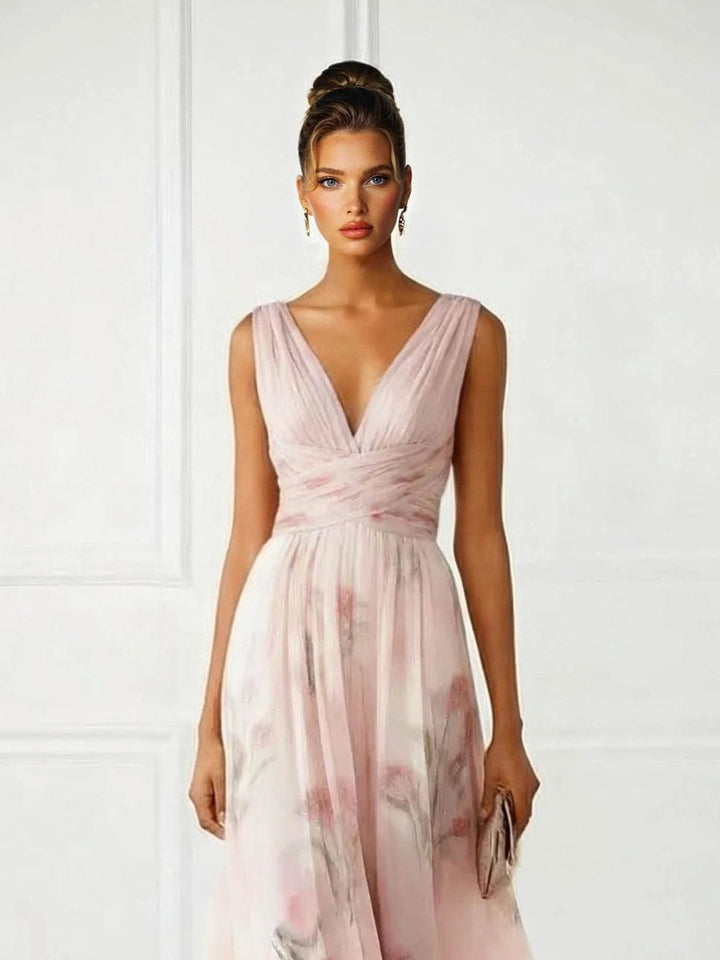 Beautiful women's sleeveless V-neck floral maxi dress in pink, designed for wedding guests & elegant events.