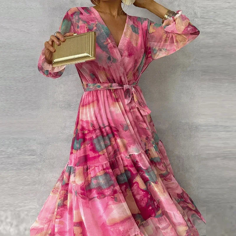 Long formal pink floral wrap dress for women, ideal for parties, weddings, and elegant events.