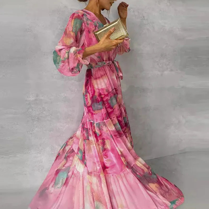 Women's beautiful pink floral print wrap dress, a stylish and elegant choice for spring wedding guests.