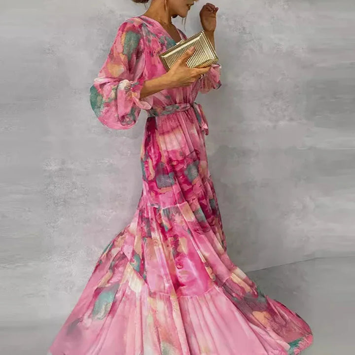 Women's beautiful pink floral print wrap dress, a stylish and elegant choice for spring wedding guests.