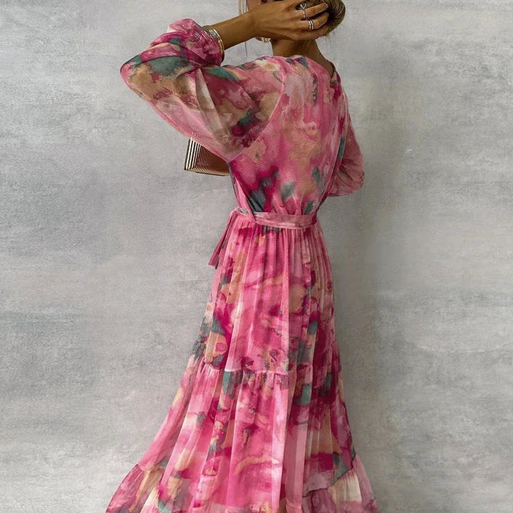 Graceful pink floral wrap long dress for women, an elegant formal wear option for special occasions.