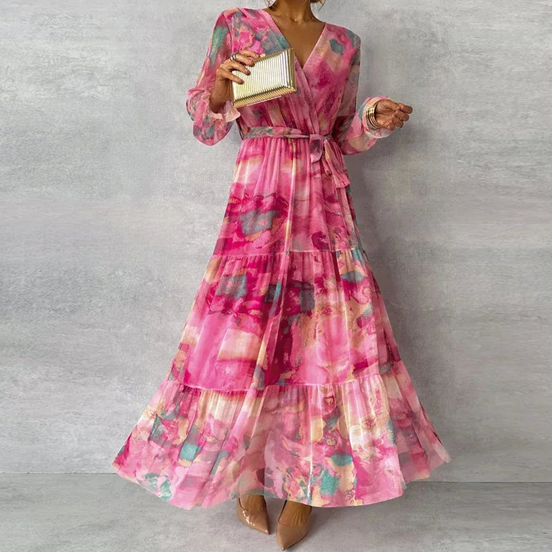 Stylish women's long pink wrap floral dress, perfect elegant formal wear for wedding guests and parties.