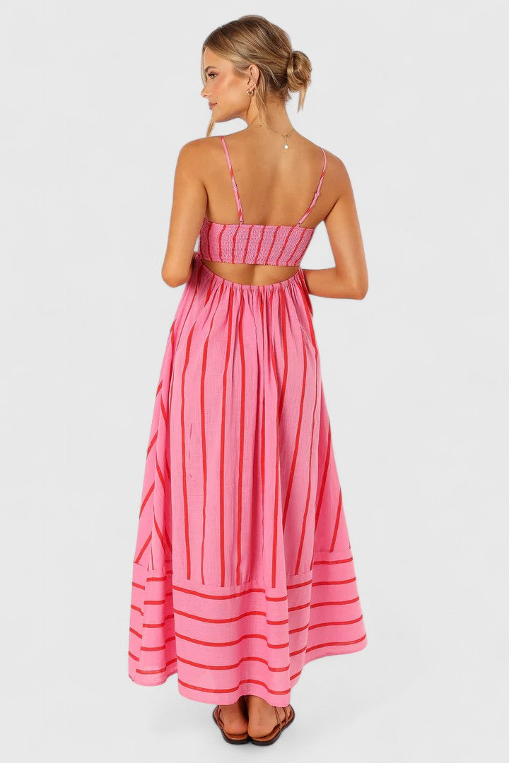 Chic evening pink maxi dress for women, an elegant long gown with a flowing silhouette for special occasions.