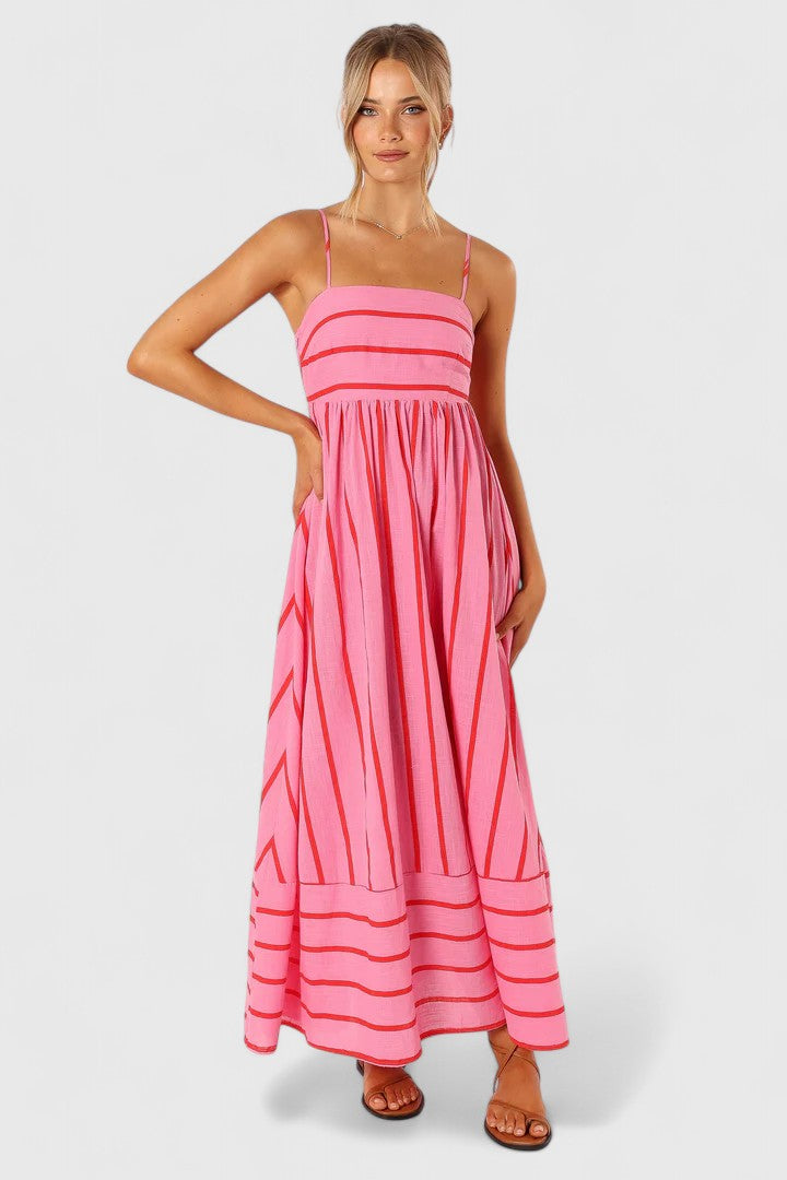 Women's fashion: elegant pink maxi dress, a versatile long dress with a flowing design for summer and beyond.