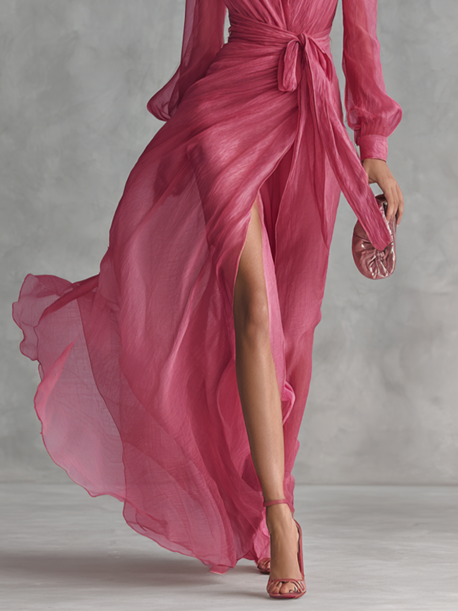 Beautiful pink formal evening dress for women, A-line cut with a plunging neck, long sleeves, and graceful floor length.