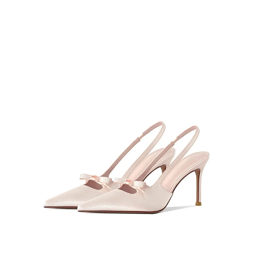 Elegant women's pink pointed toe slingback heels, perfect dress shoes for formal events & evening wear.