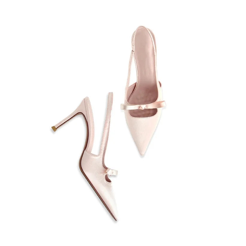 Versatile women's pink pointed toe slingback heels, ideal for parties, office or comfortable formal wear.