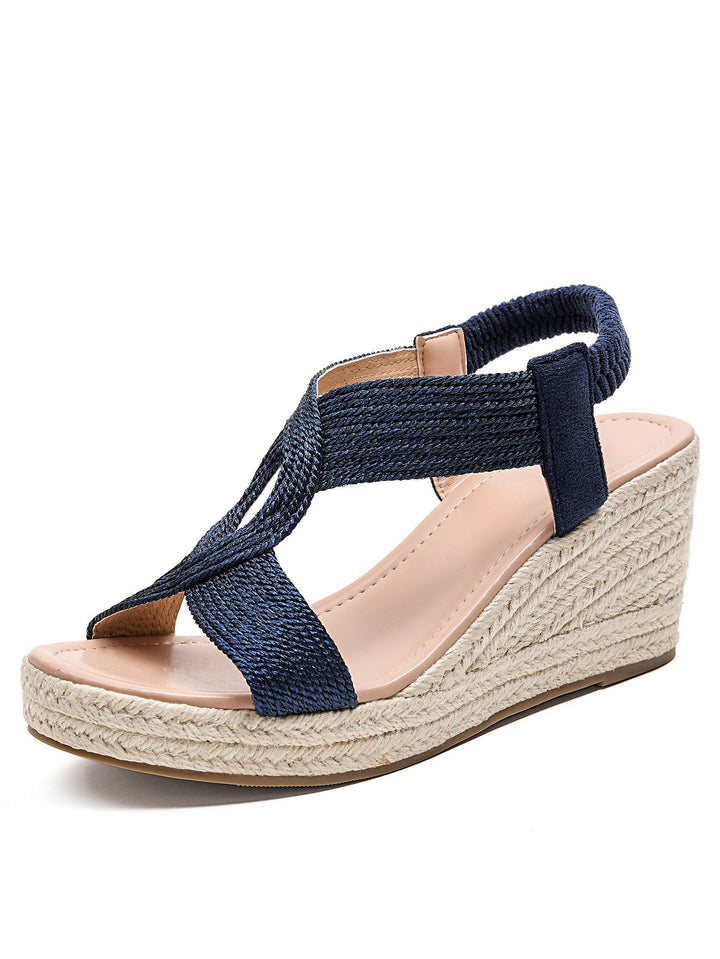 Criss-cross strap women's platform wedge sandals, offering a secure fit and fashionable summer elegance.