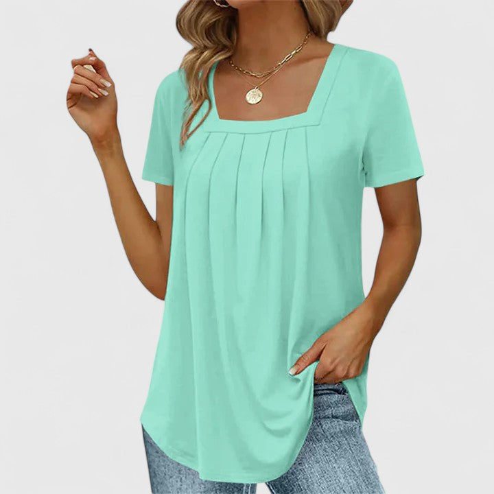 Stylish square neck summer blouse for women, featuring elegant pleats and short sleeves, casual chic.
