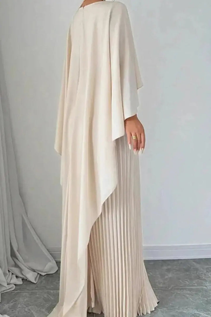 Stunning formal pleated maxi evening dress with a flowy cape, perfect for gala events & sophisticated wear.