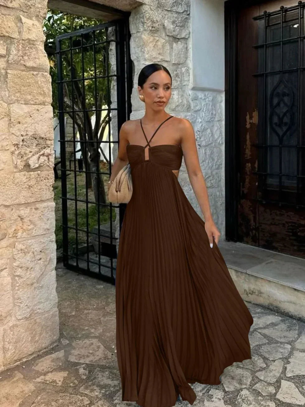 Beautiful women's pleated maxi dress with a sophisticated halter neck and trendy side cut-outs for a flattering look.