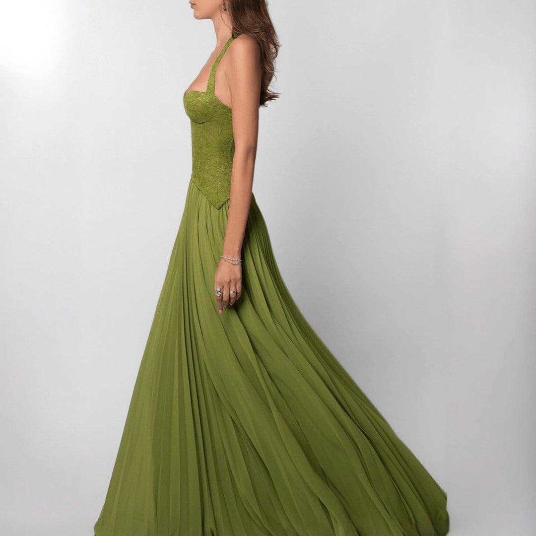Women's formal occasion dress with elegant pleats and a flattering halter neck for special events.