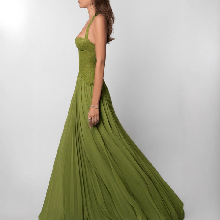 Women's formal occasion dress with elegant pleats and a flattering halter neck for special events.