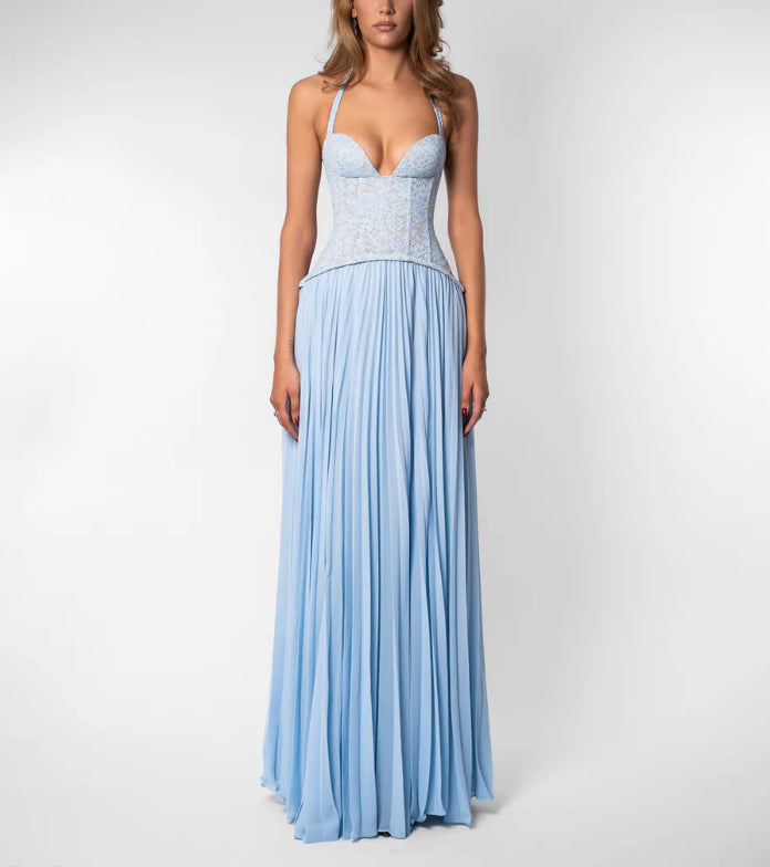 Chic women's occasion dress; features a pleated maxi skirt and a refined halterneck bodice.