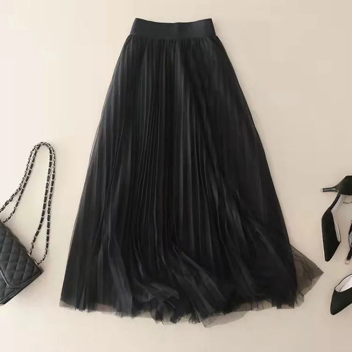 Fashionable women's A-line midi skirt featuring elegant pleats & high-waisted design, offering a flowing, versatile look.