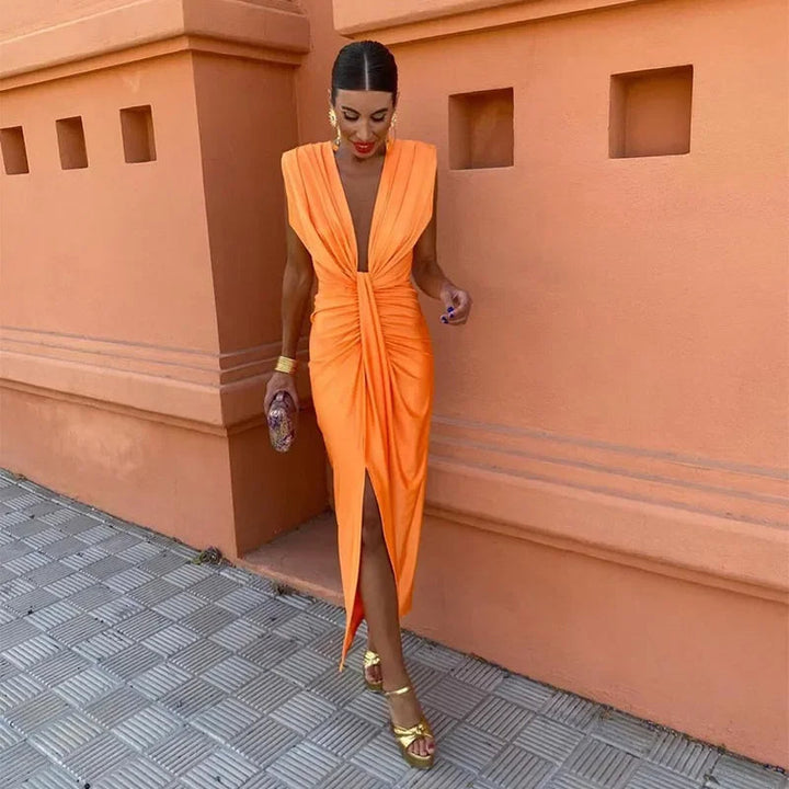Chic sleeveless women's maxi dress with elegant pleats and a flattering high waist, ideal for any occasion.
