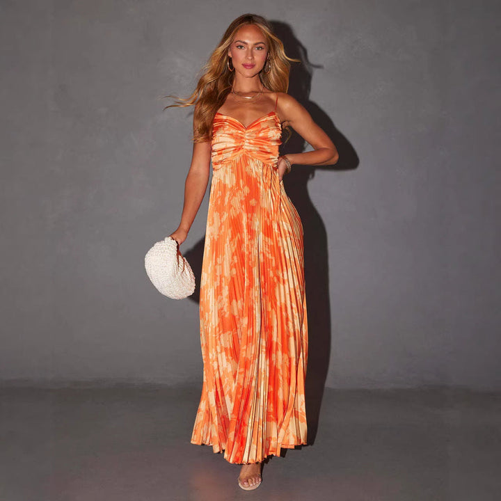 Flowy Women's Pleated Maxi Dress with a unique abstract print & sweetheart neckline. Great for formal events & occasions.