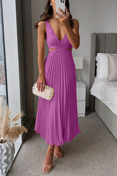 Women's flowy maxi dress showcasing a V-neck and stylish cut-out waist. An elegant choice for parties.