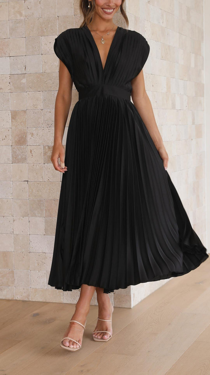 Sophisticated women's long dress, elegantly pleated with a flowing silhouette for maximum chic.