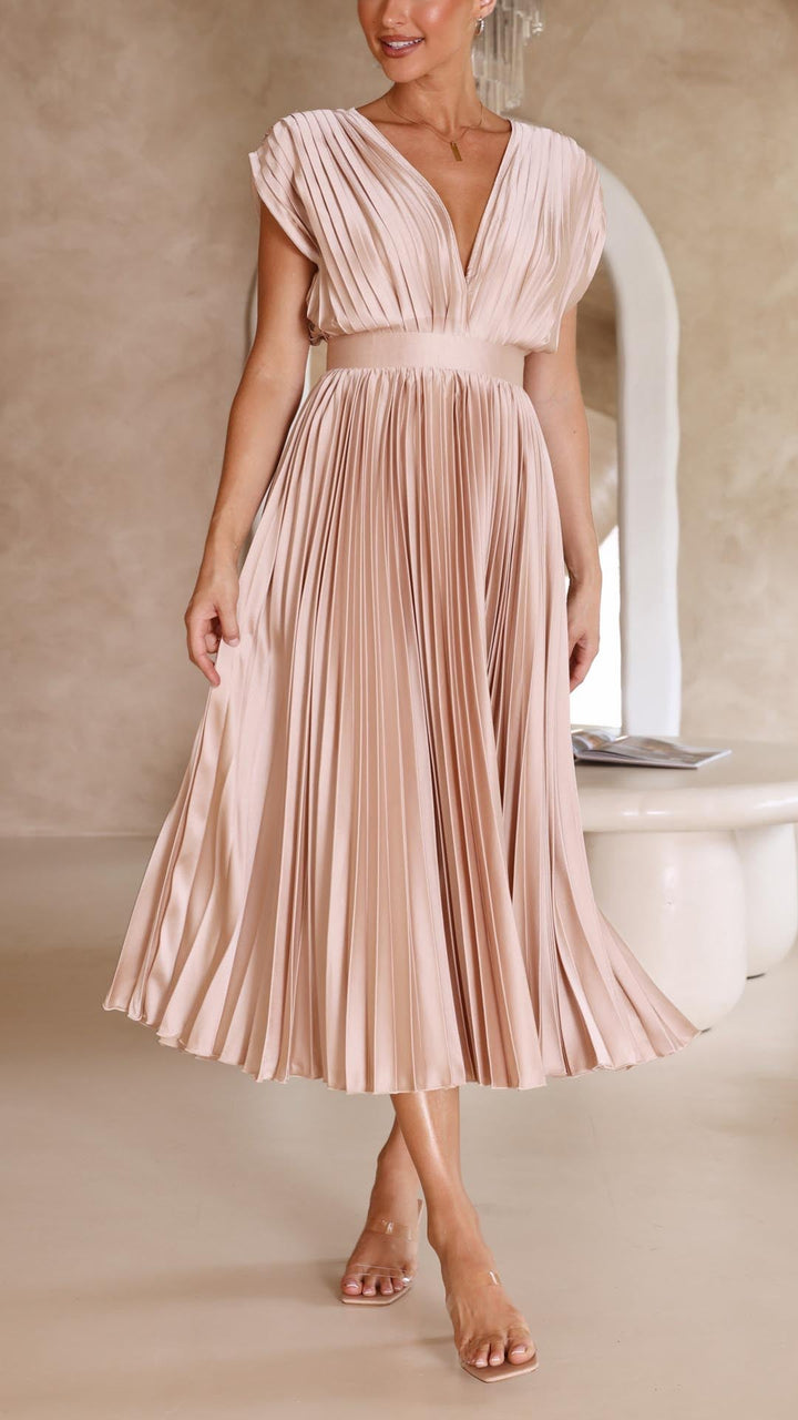 Formal women's pleated maxi dress, a chic and flowing design for sophisticated occasions.