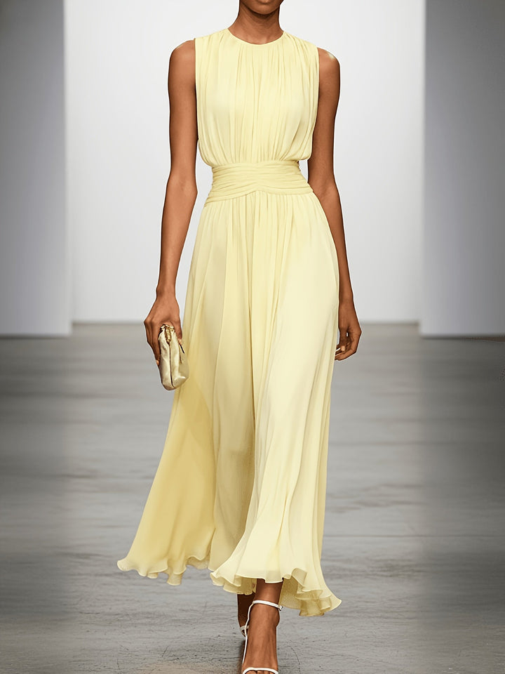 Flowing pleated maxi dress for women, with an elegant ruched waist, perfect for summer parties & events.