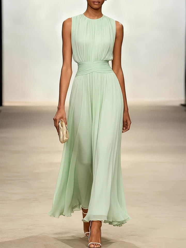 Women's elegant long pleated dress, sleeveless, with a graceful ruched waist, perfect for formal wear.