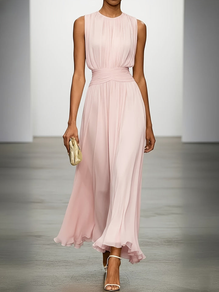 Stylish women's maxi wedding guest dress with delicate pleats & a flattering ruched waist for parties.