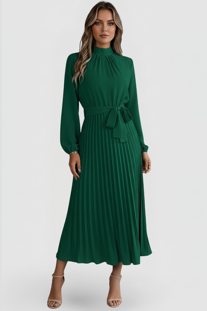 Fashionable women's midi dress featuring a pleated design & mock neck for wedding guests.