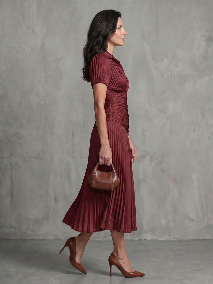 Pleated stripe midi dress for women, elegant and comfortable for everyday spring outfits.