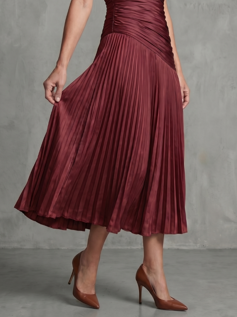 Women's collared stripe midi dress with beautiful pleats and short sleeves, refined for summer.