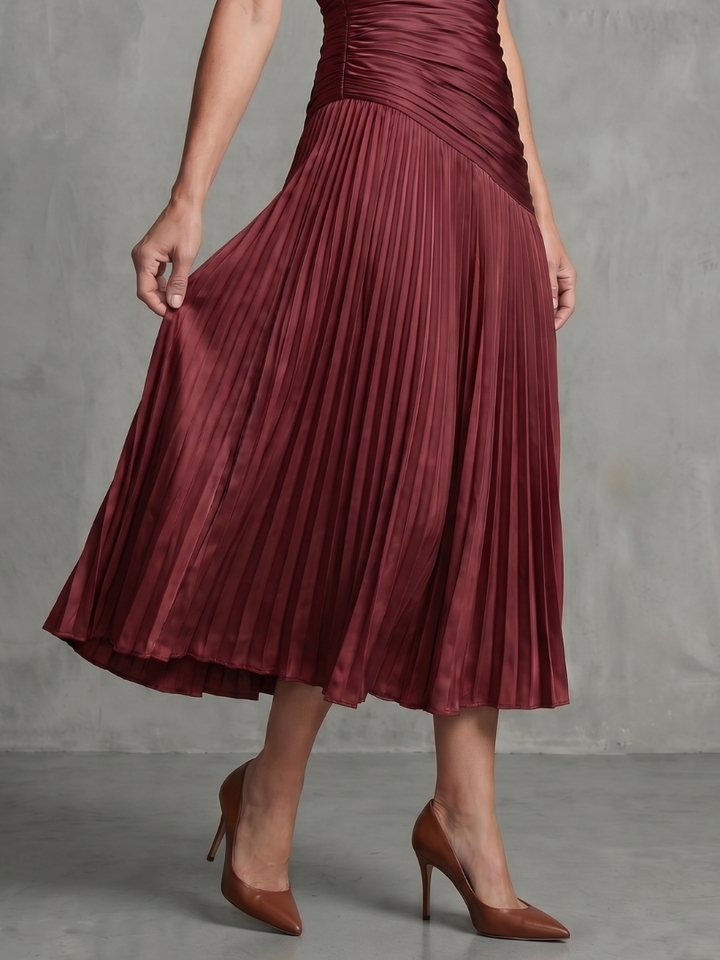 Women's collared stripe midi dress with beautiful pleats and short sleeves, refined for summer.