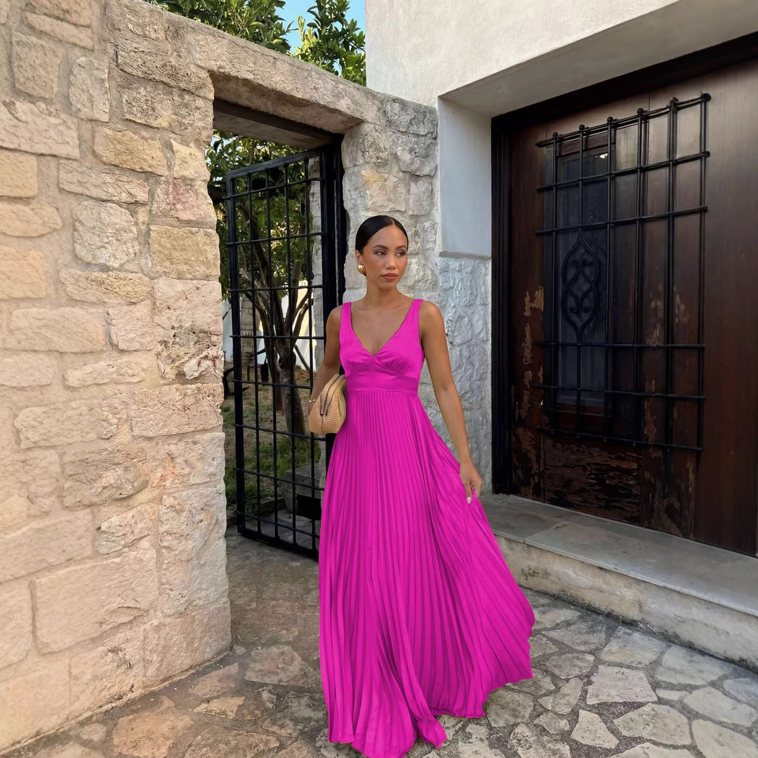 Chic sleeveless V-neck maxi dress with delicate pleats, ideal for wedding guests & formal events.
