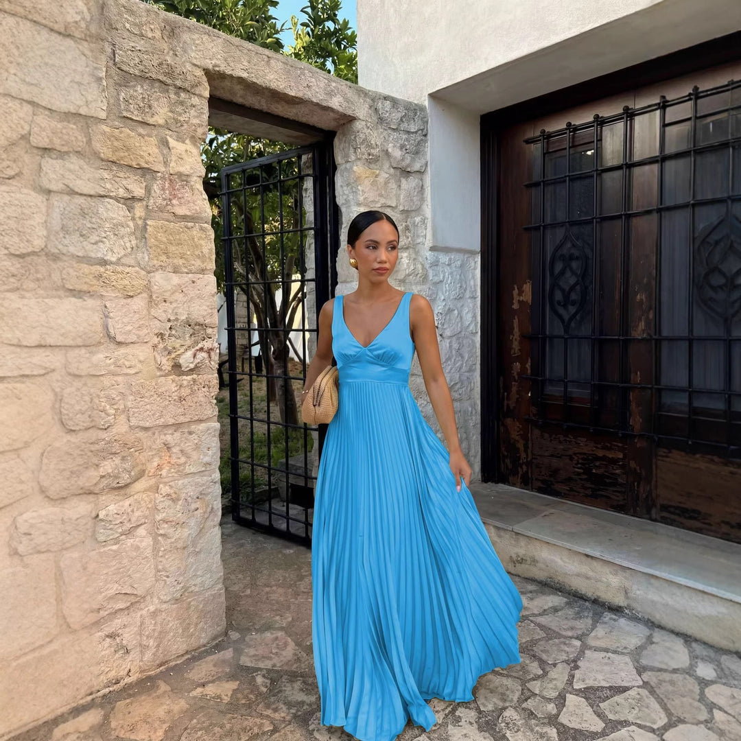 Long flowing pleated V-neck evening gown for women, a sophisticated choice for special occasion parties.