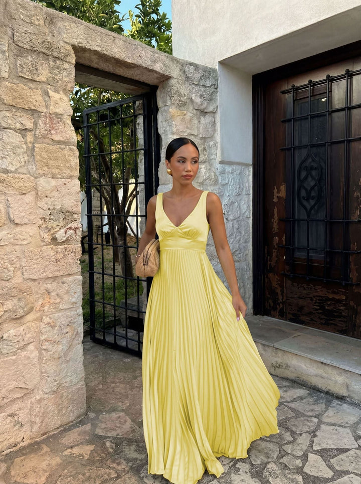 Stylish V-neck pleated maxi dress for women, offering an elegant look for any formal or party event.