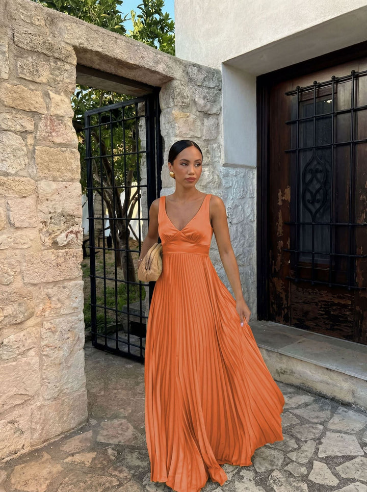 Graceful women's pleated V-neck evening dress, a long elegant gown ideal for special occasion wear.