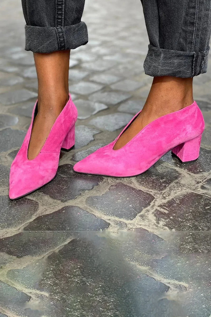Red pointed closed-toe block heels for women. Stylish and stable, perfect for elegant dress, formal, and fashion wear.