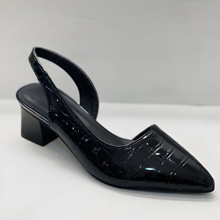 Chic women's pointed toe flats with an adjustable slingback strap, offering an elegant & secure fit.
