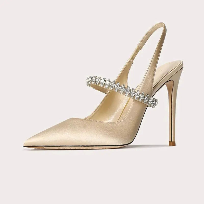 Fashion-forward women's pointed toe slingback heels with a sparkling jeweled ankle, perfect formal party footwear.
